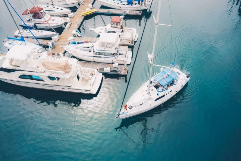 white-boat-leaving-the-marina-docks-sailing-on-the-2023-11-27-05-13-36-utc